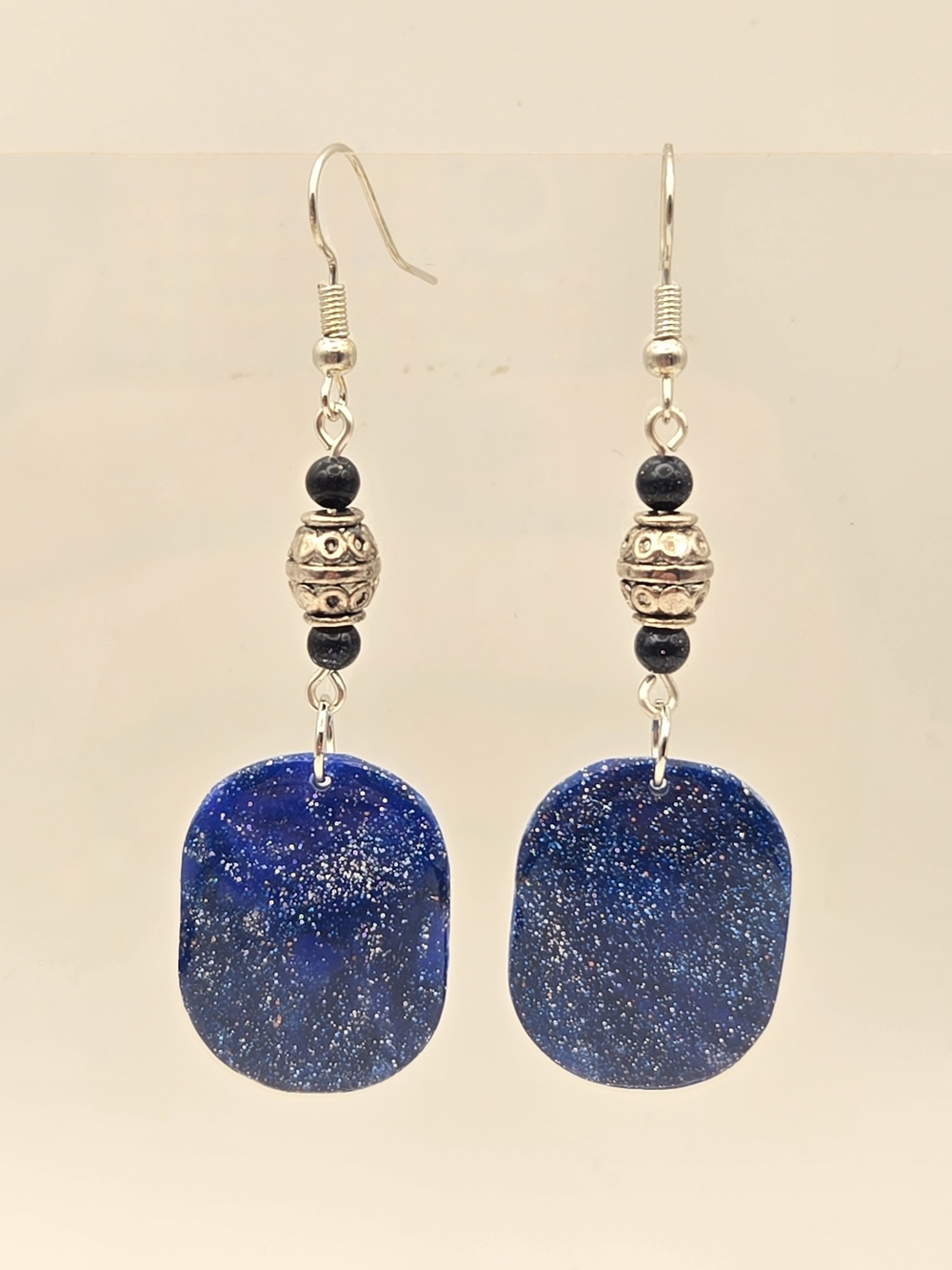 #B187- Silver-Accent Deep Blue Glitter Drop Earrings - Sandstone